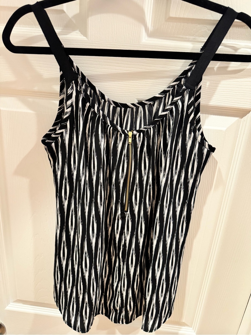 Black & White Sleeveless Zip Front Blouse 
Macy’s Size Sm